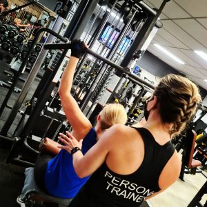 Catalyst 24/7 Fitness personal trainer with gym member